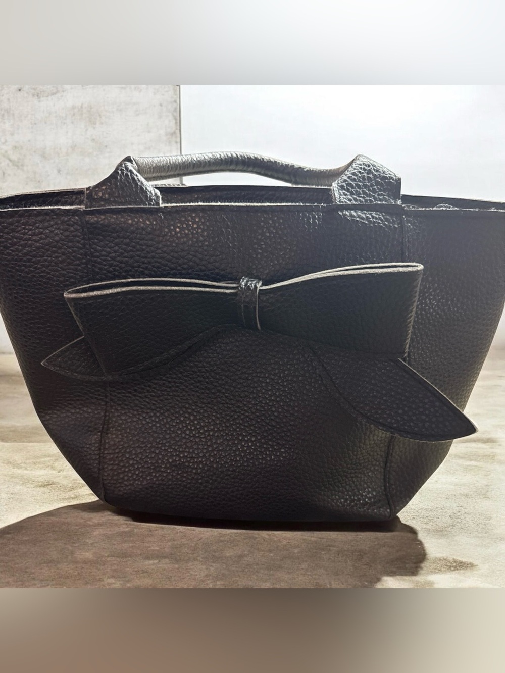 Stylish Black Tote Bag with Decorative Bow